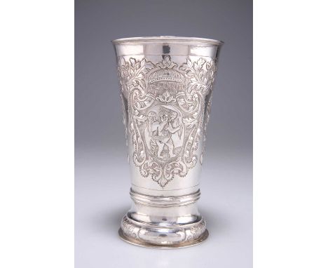 AN 18TH CENTURY RUSSIAN LARGE SILVER BEAKER Moscow 174?, of tapering form, raised on a stepped circular base, embossed with a