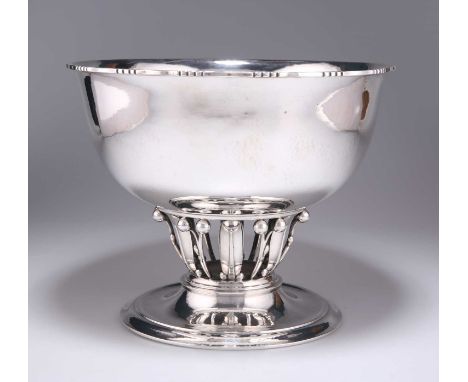 GEORG JENSEN: A DANISH STERLING SILVER PEDESTAL BOWL, CIRCA 1930 no. 19B, the large bowl raised on a pierced berry and foliat