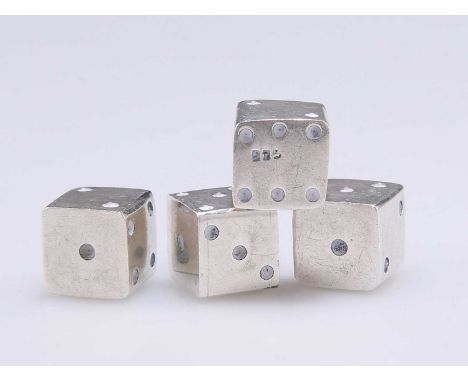 A SET OF FOUR DICE marked '925'. (4) 1cm squareLight general wear.