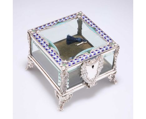 A FINE ENAMEL AND GLASS CASKET of square form with glass sides and hinged cover, the cover mounted with a decorative fleur-de