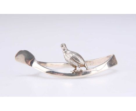 A GEORGE V SILVER NOVELTY NAPKIN RING by G &amp; C Hodgetts, Birmingham 1915, as a wishbone with a grouse. 6.3cm longSome lig