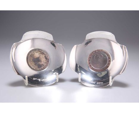 A PAIR OF LATE VICTORIAN SILVER 'CARTWHEEL PENNY' COIN DISHES by Andrew Barrett &amp; Sons, London 1897 and 1898, the shaped 