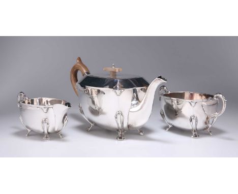 AN ART DECO SILVER THREE-PIECE TEA SERVICE by Stower &amp; Wragg Ltd, Sheffield 1937, curvilinear rectangular, comprising tea