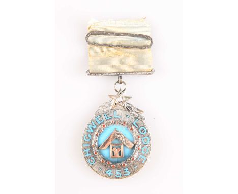 A VICTORIAN ENAMELLED MASONIC PAST MASTER BREAST JEWEL the circular plaque with central square and compass to a blue enamel g