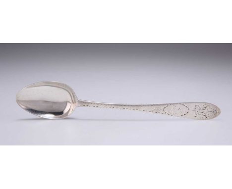 AN IRISH PROVINCIAL SILVER DESSERT SPOON by Patrick Connell, Limerick, late 18th Century, with bright-cut engraving, engraved