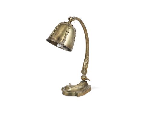 A BRASS ANGLEPOISE DESK LAMP EARLY 20TH CENTURY the cupped shade cast with bellflower trails, on an adjustable support with f