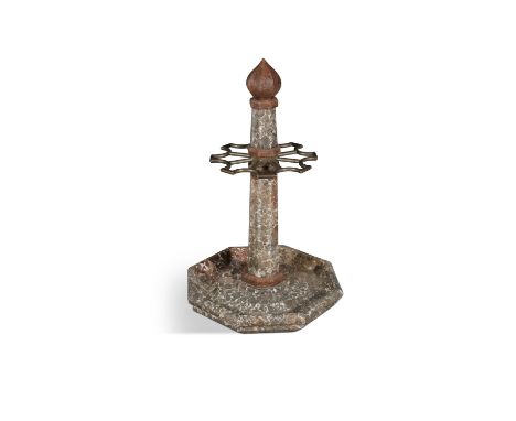 A BROWN AND ROUGE MARBLE STICK AND UMBRELLA STAND of shaped circular form, surmounted with pointed bud finial over a tapering