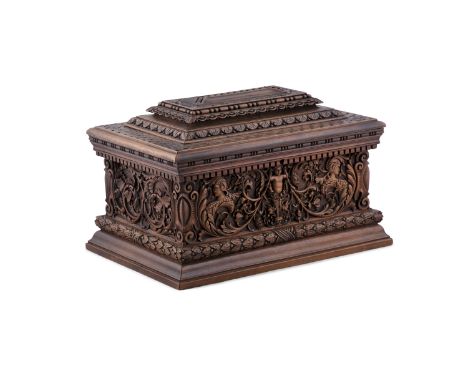AN ITALIAN RENAISSANCE STYLE HARDWOOD CASKET, of rectangular shape with domed cover enclosing a lined interior, the exterior 