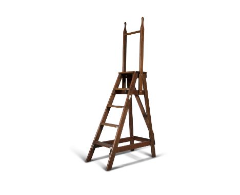 A SET OF MAHOGANY LIBRARY STEPS, by Slingsby, of triangular form, with tapering pole handrail. 198cm high x 88cm deep x 44cm 