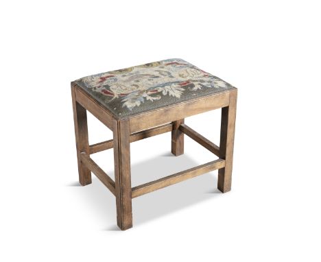A GEORGIAN STYLE MAHOGANY FRAMED STOOL, on square section frame, the top upholstered in an old tapestry fragment. 51 x 39 x 4