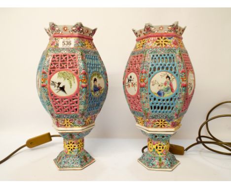 A pair of Chinese lantern style porcelain light fittings, 34cm tall 