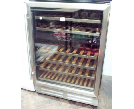 A six shelf glass door bottle cooler in stainless steel case