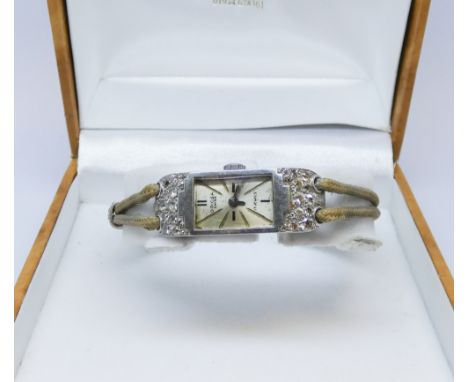 Art deco ladies platinum and diamond set cocktail watch by Oriosa, on  fabric strap.