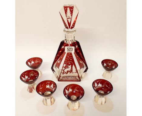 A Bohemian ruby red overlaid glass decanter and six glasses in the Art Deco style 