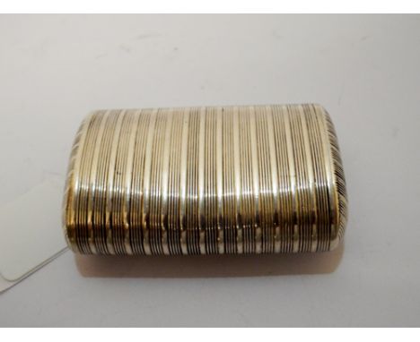 A silver snuff box with ribbed decoration and hallmarks for Birmingham 1812  7cms long 4.5cms wide 