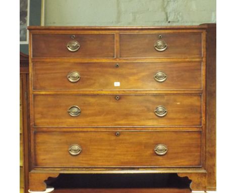 A Georgian mahogany chest of three long and two short drawers with brass handles standing on bracket feet 3'6 wide 