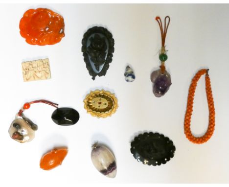 An interesting collection of objects to include Victorian coral bracelet, jet pendants, carved oriental agate pendants and ch