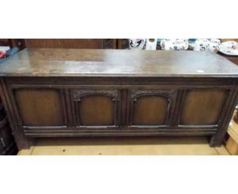 A reproduction oak four panel blanket chest 4' wide 