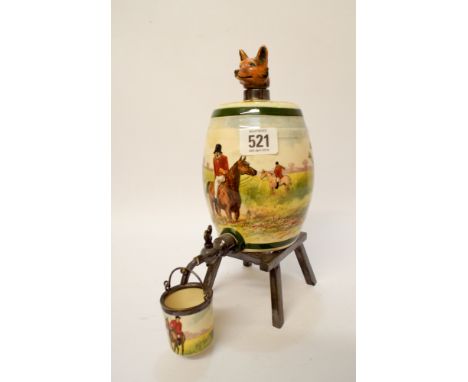 A small Royal Doulton spirit barrel with plated mounts on a plated stand with a fox head stopper and a hunting scene depicted