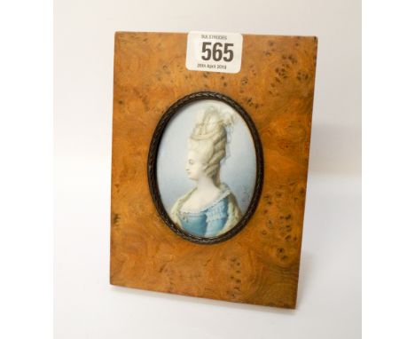 A portrait miniature of a lady, "signed Neigez" set in an easel frame