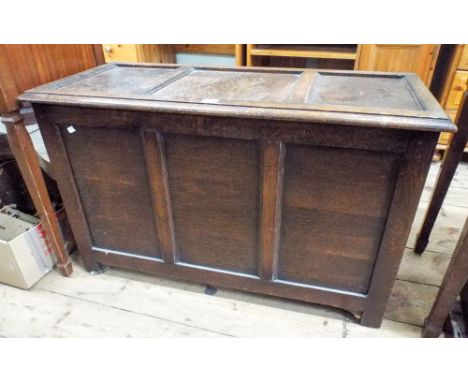 A reproduction oak three panel blanket chest 3' wide 