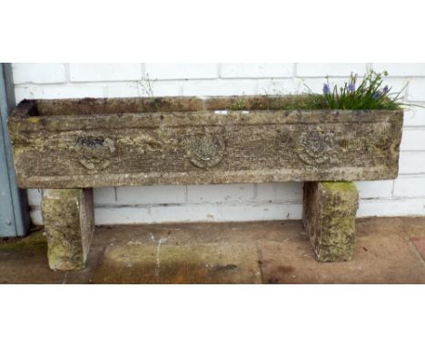 A reconstituted stone garden trough shaped planter approx 3'6 long  