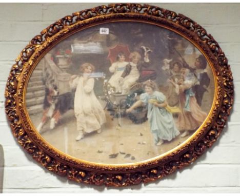 An oval Victorian coloured print of children playing in a good quality acanthus decorated gilt frame, the frame is approx 27"