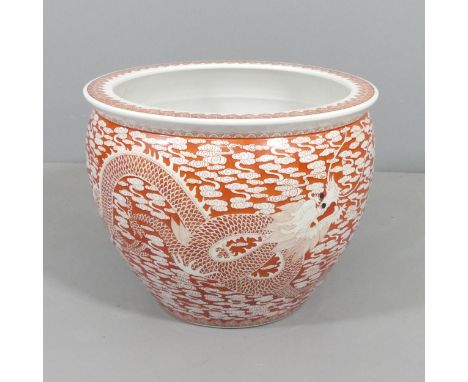 A large and impressive Chinese planter with dragon and carp decoration, six character marked to base. 51x41cm
