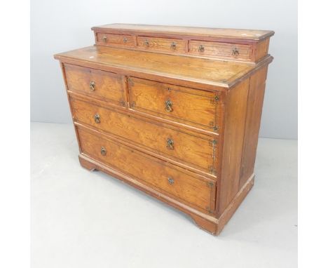 A modern pitch pine dresser base, with two short and two long drawers, with raised back fitted with three drawers, 122x101x55