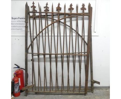 A pair of wrought iron gates with fleur-de-lis finials. Each (including hinge) 128x168cm. Good condition. Some corrosion, one