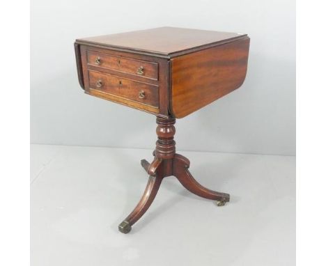 A 19th century mahogany drop leaf sewing table, with two drawers and raised on a turned central column with tripod base. 42 (