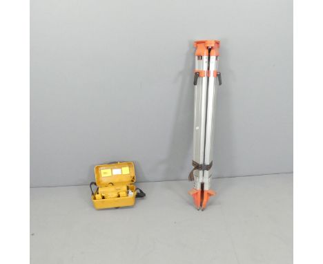 A Topcon AT-G7 surveyor's leveller, with case and tripod stand.