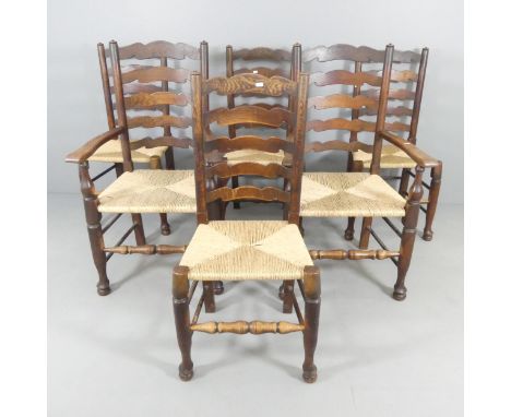 A set of six North country style oak and rush seated ladder back dining chairs (4+2).