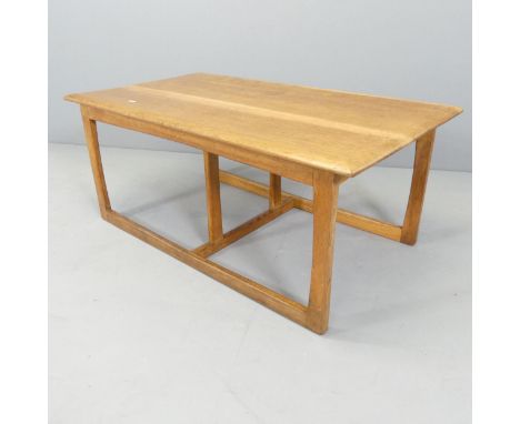 A mid-century light oak coffee table. 98x40x54cm.