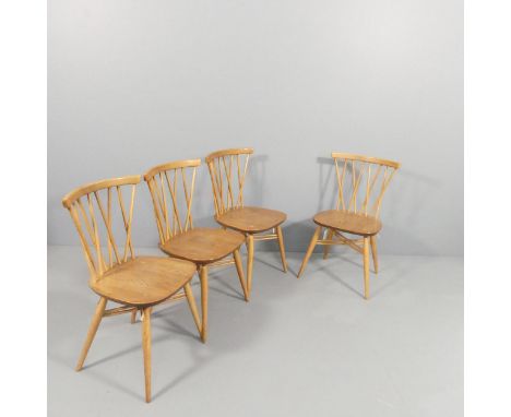 ERCOL - A set of four Shallstone candlestick dining chairs.
