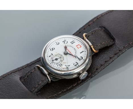 GENTLEMAN'S EARLY TWENTIETH CENTURY STERLING SILVER TRENCH STYLE WRISTWATCH
by Angora Watch Co., unsigned fifteen jewels manu