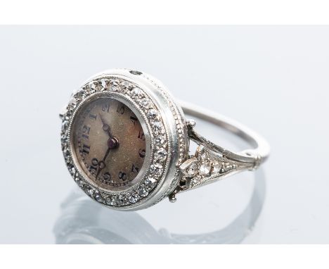 FINE LADY'S ART DECO PLATINUM AND DIAMOND RING WATCH
unsigned jewelled manual wind movement, the dial with Arabic numerals, t