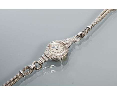 LADY'S ART DECO PLATINUM AND DIAMOND ROLEX COCKTAIL WATCH
signed Rolex Geneve seventeen jewels manual wind movement, the sign