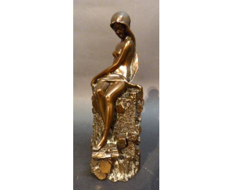Giovanni Schoemann
A Patinated Metal Figure in the Form of a Girl Upon a Tree Trunk, signed, 14 cms tall