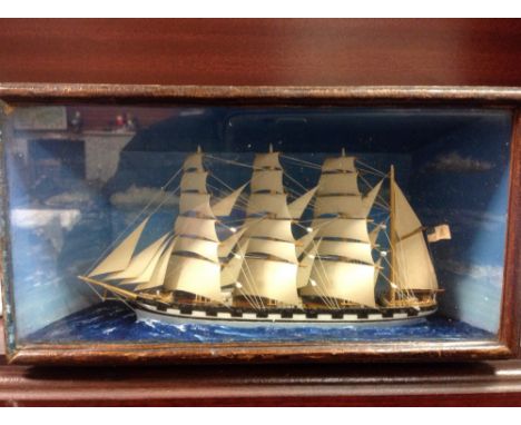 A 19th Century Scale Model of the Merchant Ship Doris Four Masted within Glazed Cabinet, 21 cms wide