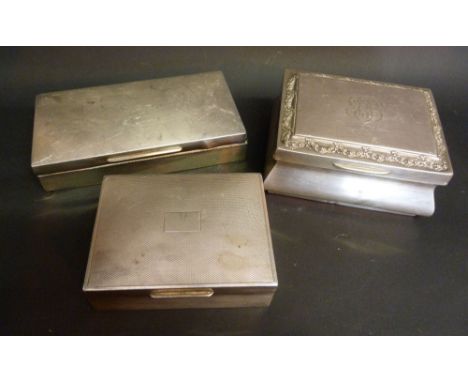 A London Silver Jewellery Casket, together with a Birmingham silver cigarette case and another similar London silver cigarett