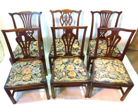 A Harlequin Set of Six 19th Century Chippendale Style Dining Chairs, each with a splat back above a tapestry drop-in seat rai