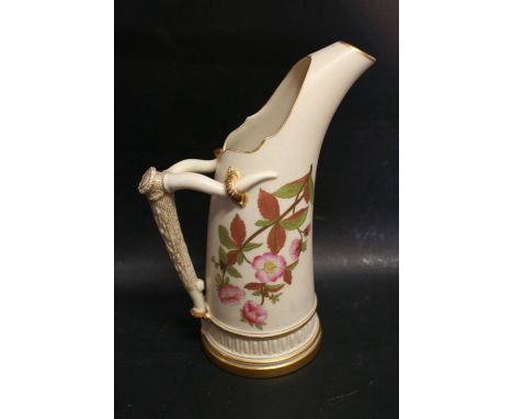 A Royal Worcester Blush Ivory Tusk Vase, hand painted with summer flowers and highlighted with gilt, 23.5 cms tall