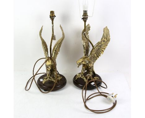 Pair of brass table lamps, in the form of eagles, 34 cm high, and a six light brass chandelier with glass pendants, 56 cm dia