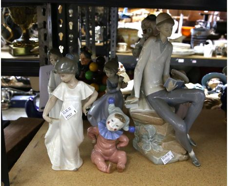 LLadro figure of a boy reading, 30 cm high, six other Lladro, Nao and other Spanish figures, and a Royal Doulton figure of th