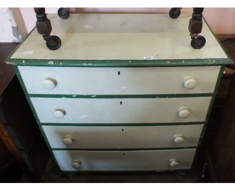 A vintage painted chest of four drawers