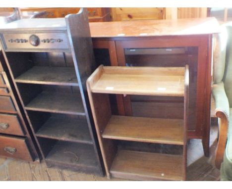 A floor standing two door glazed display cabinet and two vintage bookcases