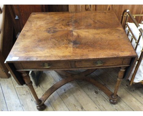 A mahogany inlaid sofa table with two drawers on stretcher base