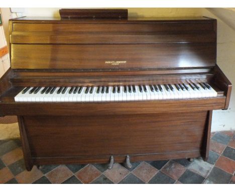 A Barratt & Robinson light mahogany upright piano