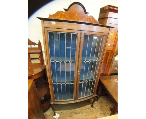 A mahogany and lead glazed bow fronted inlaid display cabinet